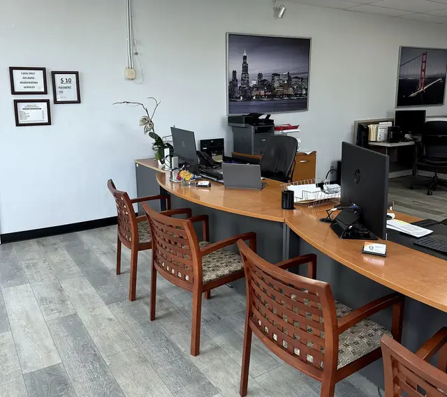 Front desk and customer seating at Queen Insurance Services